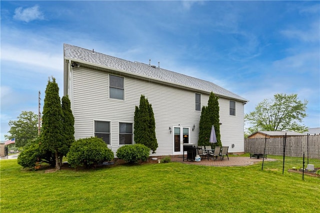704 Park Ave, Rostraver, PA 15012 - rear view of property with a patio area and roof with shingles