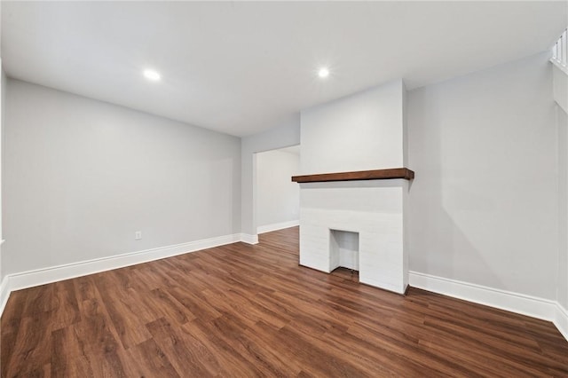 1110 Illinois Ave, Dormont, PA 15216 - unfurnished living room with baseboards, dark wood-type flooring, and recessed lighting
