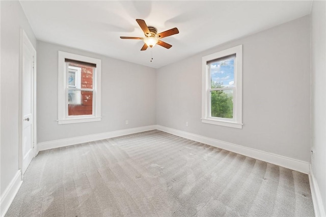 1110 Illinois Ave, Dormont, PA 15216 - empty room featuring carpet flooring, a ceiling fan, and baseboards