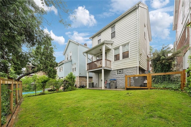 1110 Illinois Ave, Dormont, PA 15216 - rear view of property with stone siding, a balcony, and central air condition unit