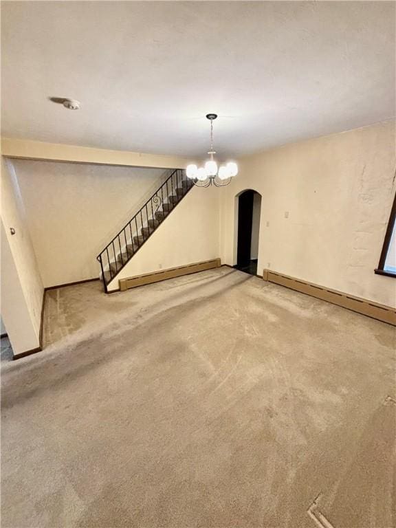 7027 Blackhawk St, Swissvale, PA 15218 - unfurnished living room with arched walkways, a baseboard radiator, carpet, stairs, and a chandelier
