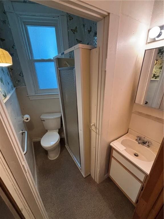 7027 Blackhawk St, Swissvale, PA 15218 - bathroom with wallpapered walls, vanity, and toilet