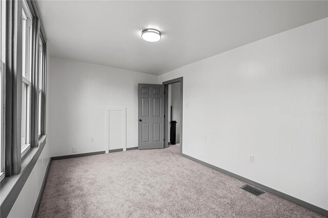 1815 Ohio Ave, White Oak, PA 15131 - spare room featuring carpet floors and baseboards