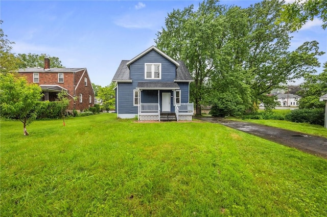 1815 Ohio Ave, White Oak, PA 15131 - rear view of property featuring a porch and a lawn