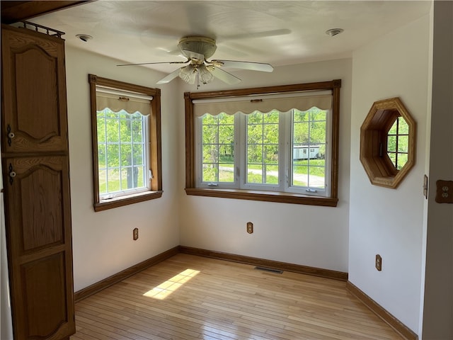 100 Rohaley Ln, Menallen Twp, PA 15480 - unfurnished room featuring ceiling fan, light wood finished floors, and baseboards