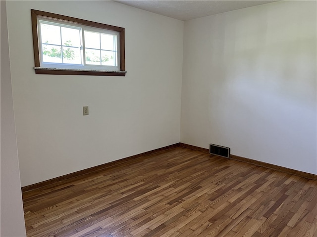 100 Rohaley Ln, Menallen Twp, PA 15480 - empty room featuring dark wood finished floors and baseboards