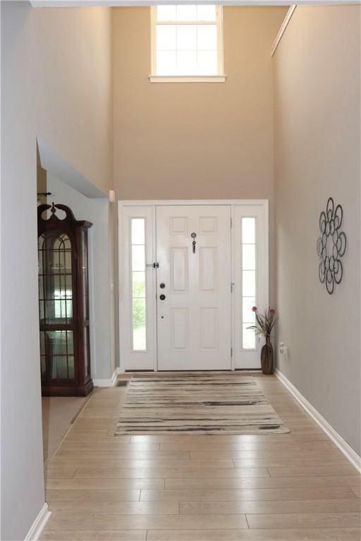 127 Benton, Canonsburg, PA 15317 - foyer featuring a high ceiling, hardwood / wood-style floors, baseboards, and healthy amount of natural light