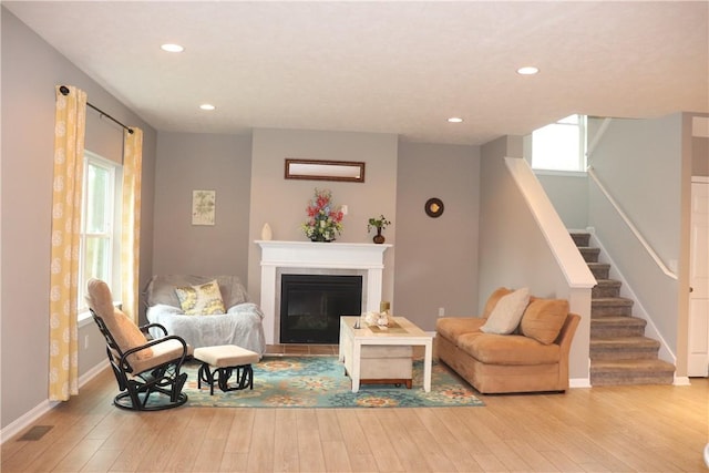 127 Benton, Canonsburg, PA 15317 - living room featuring stairway, wood-type flooring, recessed lighting, and plenty of natural light