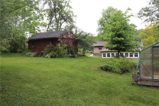 127 Benton, Canonsburg, PA 15317 - view of grassy yard with an outbuilding and a greenhouse