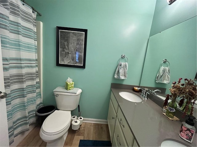 127 Benton, Canonsburg, PA 15317 - full bath featuring wood finished floors, vanity, toilet, baseboards, and curtained shower
