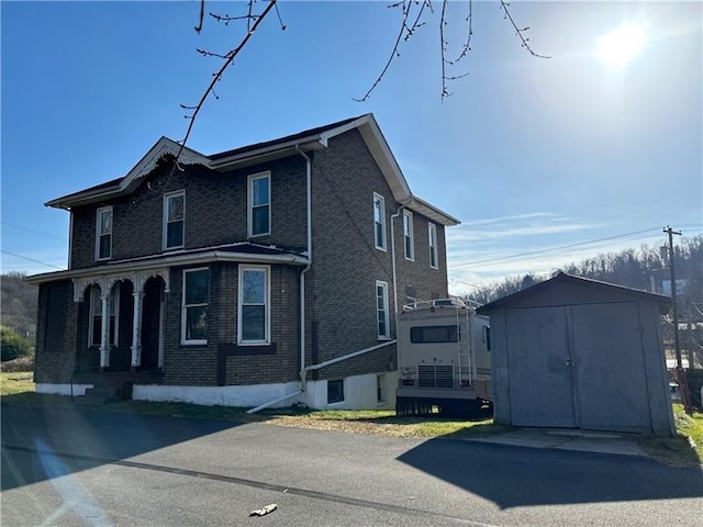 28 S Railroad St, Manor, PA 15665 - view of front facade featuring brick siding