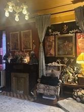 28 S Railroad St, Manor, PA 15665 - living area featuring a fireplace and a chandelier