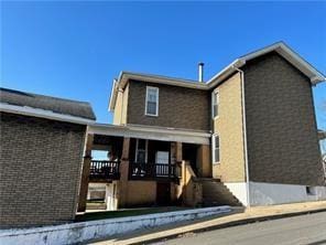 28 S Railroad St, Manor, PA 15665 - rear view of property featuring a porch