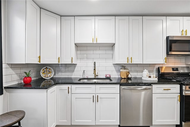 134 Poplargrove St, Carrick, PA 15210 - kitchen featuring appliances with stainless steel finishes, a sink, and white cabinetry