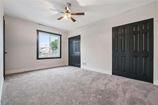134 Poplargrove St, Carrick, PA 15210 - unfurnished bedroom with two closets, carpet flooring, and baseboards