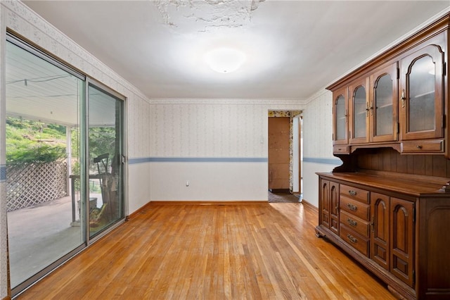 173 Mcintyre Rd, Ross Twp, PA 15237 - unfurnished room featuring wallpapered walls, light wood-style floors, and baseboards