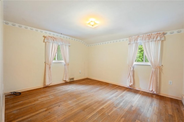 173 Mcintyre Rd, Ross Twp, PA 15237 - spare room with healthy amount of natural light, light wood-type flooring, and baseboards