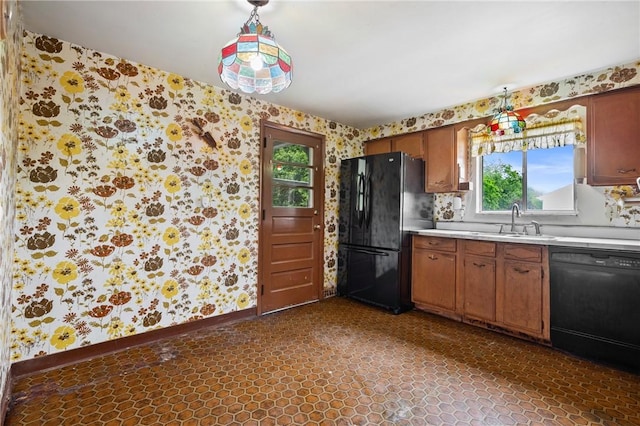 173 Mcintyre Rd, Ross Twp, PA 15237 - kitchen with wallpapered walls, black appliances, a sink, light countertops, and healthy amount of natural light