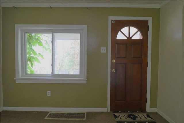 1818 Bluff St, West Mifflin, PA 15122 - entrance foyer with baseboards, crown molding, and carpet