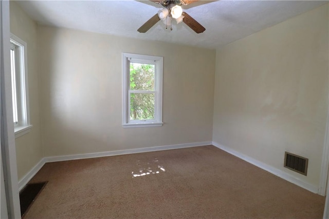 1818 Bluff St, West Mifflin, PA 15122 - carpeted empty room with ceiling fan and baseboards