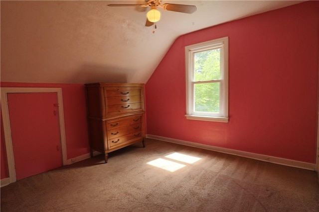 1818 Bluff St, West Mifflin, PA 15122 - additional living space with vaulted ceiling, a ceiling fan, baseboards, and light carpet