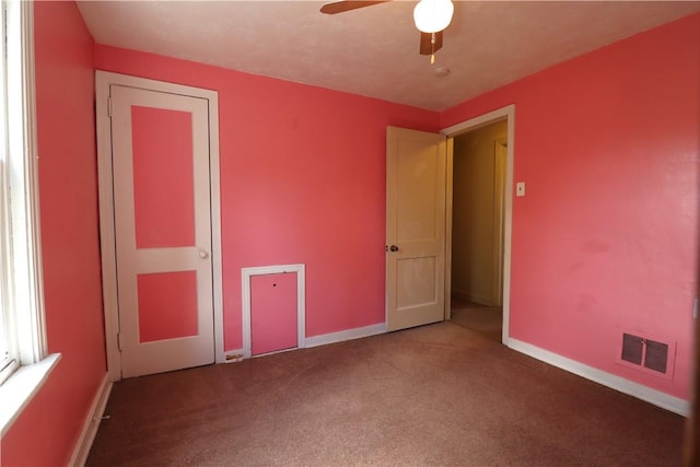 1818 Bluff St, West Mifflin, PA 15122 - unfurnished bedroom with carpet floors, baseboards, and a ceiling fan