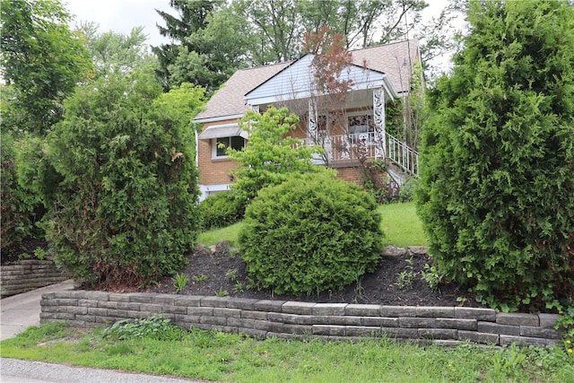 1818 Bluff St, West Mifflin, PA 15122 - view of side of home featuring roof with shingles and stairs