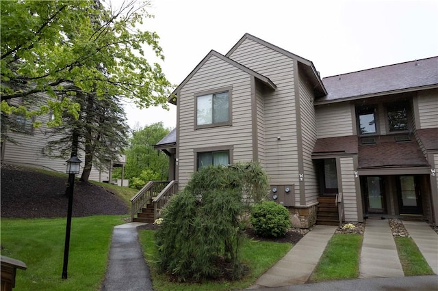 W1 Sunridge Dr, Seven Springs Resort, PA 15622 - view of front of home with a front lawn