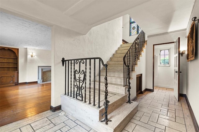 1 Robin Rd, Squirrel Hill, PA 15217 - staircase featuring baseboards
