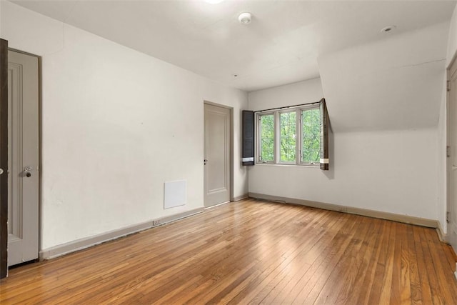 1 Robin Rd, Squirrel Hill, PA 15217 - spare room featuring hardwood / wood-style flooring, a smoke detector, and baseboards
