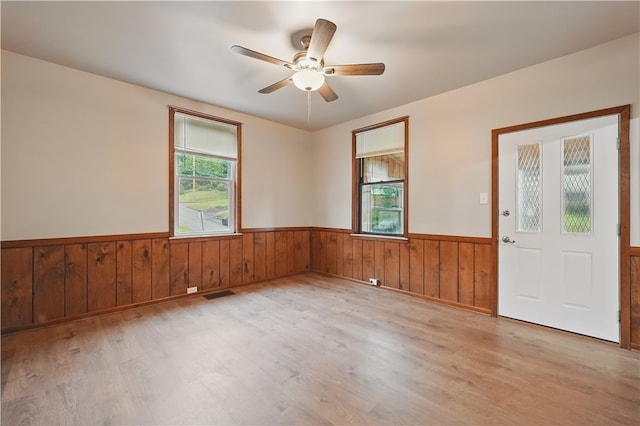 1231 19th Ave, Patterson Twp, PA 15010 - spare room with wood finished floors, a wainscoted wall, ceiling fan, and wooden walls