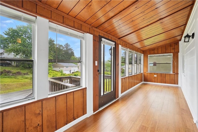 1231 19th Ave, Patterson Twp, PA 15010 - unfurnished sunroom featuring wood ceiling, lofted ceiling, wood finished floors, baseboards, and wooden walls