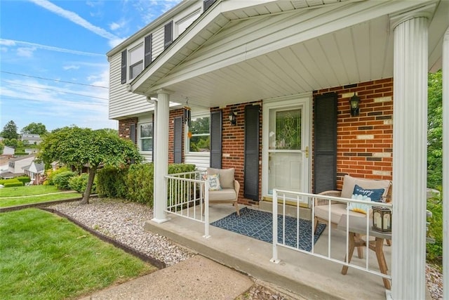534 Dendron Dr, Robinson Twp Nwa, PA 15108 - view of exterior entry featuring brick siding and a porch