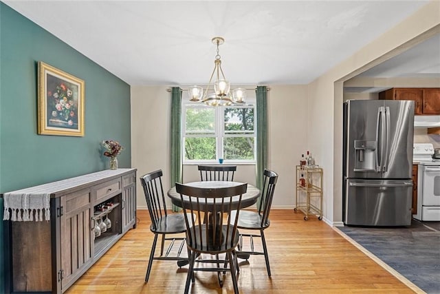 534 Dendron Dr, Robinson Twp Nwa, PA 15108 - dining area with a chandelier, light wood-style flooring, and baseboards