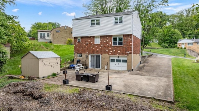 534 Dendron Dr, Robinson Twp Nwa, PA 15108 - back of property featuring a garage, brick siding, a patio, and a lawn