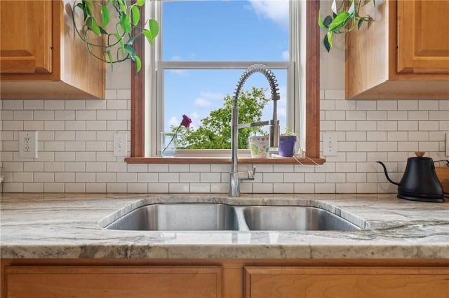1016 Noble Pine Ct, Trafford, PA 15085 - kitchen with a sink, healthy amount of natural light, and tasteful backsplash