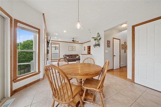 1016 Noble Pine Ct, Trafford, PA 15085 - dining space featuring light tile patterned flooring, baseboards, and ceiling fan