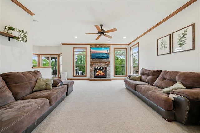 1016 Noble Pine Ct, Trafford, PA 15085 - carpeted living area featuring crown molding, a ceiling fan, recessed lighting, and a fireplace