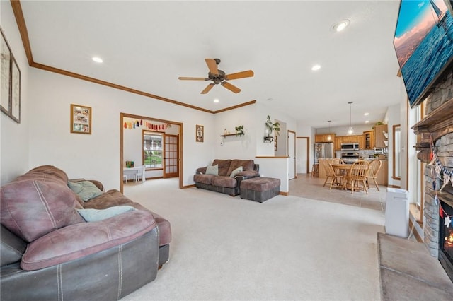 1016 Noble Pine Ct, Trafford, PA 15085 - living room featuring a stone fireplace, light colored carpet, ceiling fan, recessed lighting, and baseboards