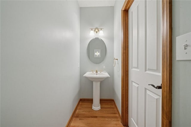 1016 Noble Pine Ct, Trafford, PA 15085 - bathroom featuring baseboards and wood finished floors