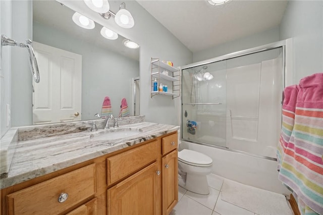1016 Noble Pine Ct, Trafford, PA 15085 - bathroom featuring vanity, toilet, combined bath / shower with glass door, and tile patterned floors