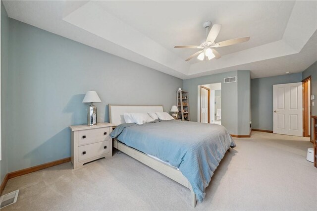 1016 Noble Pine Ct, Trafford, PA 15085 - bedroom with a raised ceiling, light colored carpet, baseboards, and ceiling fan