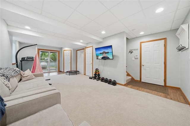 1016 Noble Pine Ct, Trafford, PA 15085 - living room with stairway, baseboards, recessed lighting, wood finished floors, and a paneled ceiling
