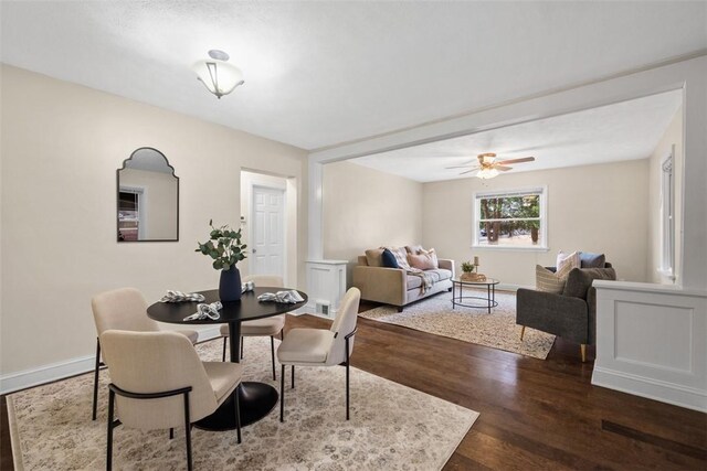 600 Camp Meeting Rd, Leet Twp, PA 15143 - dining area with dark wood-type flooring, baseboards, and ceiling fan