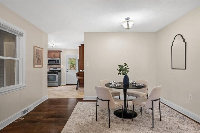 600 Camp Meeting Rd, Leet Twp, PA 15143 - dining area with wood finished floors and baseboards
