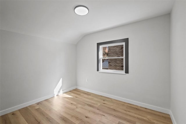 2874 Midland St, Brookline, PA 15226 - additional living space featuring vaulted ceiling, light wood-style floors, and baseboards