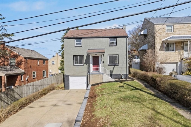 2874 Midland St, Brookline, PA 15226 - traditional-style house featuring a garage, concrete driveway, and brick siding