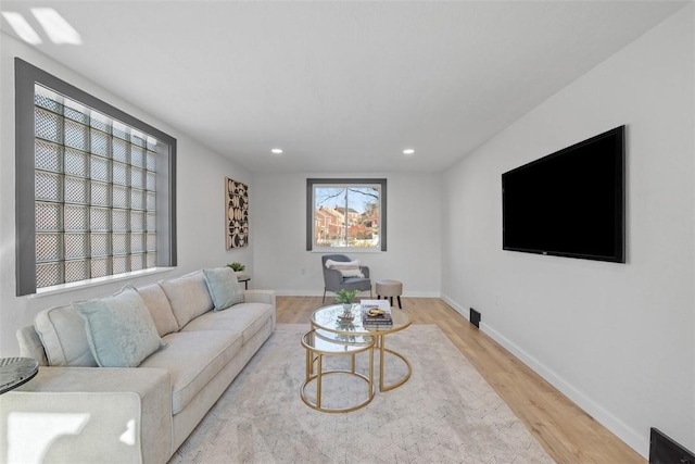 2874 Midland St, Brookline, PA 15226 - living area featuring light wood-style floors, recessed lighting, and baseboards