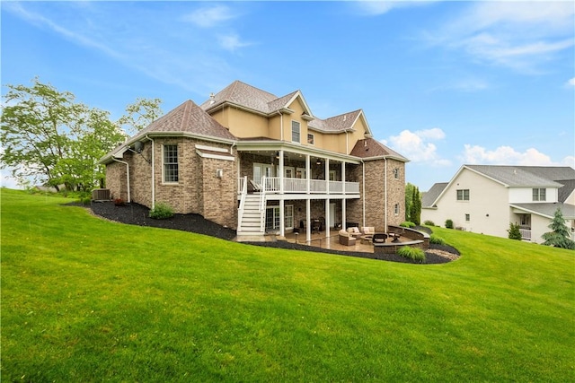 1272 Mcewen Rd, Cecil, PA 15317 - back of house featuring a patio area, a lawn, cooling unit, and brick siding