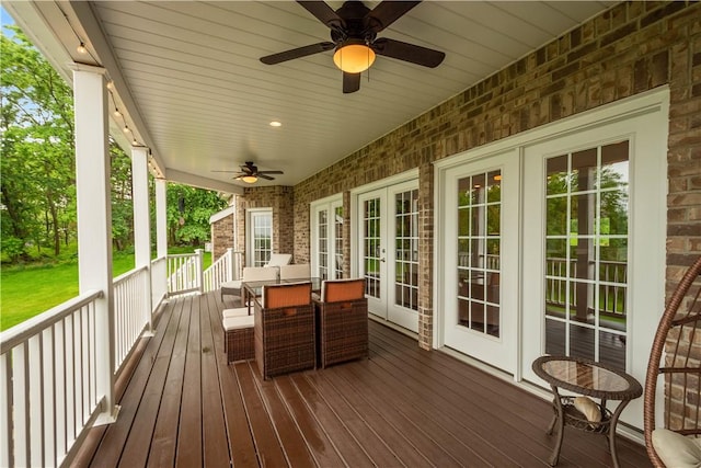 1272 Mcewen Rd, Cecil, PA 15317 - wooden deck with french doors, a ceiling fan, and outdoor dining space